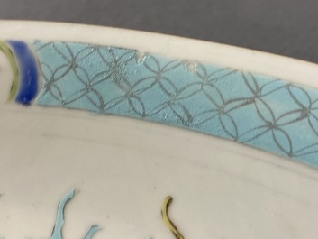 A Chinese famille rose dish with warriors on horseback, Qianlong